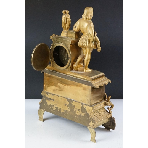 32 - 19th Century French gilt mantle clock having a gilt male figure to the top beside a white enamelled ... 