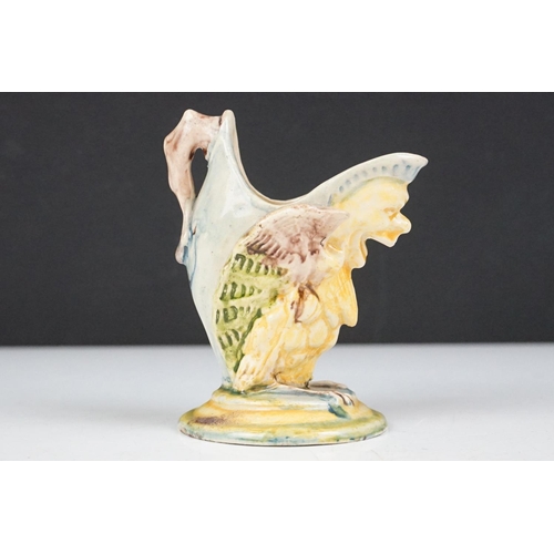 51 - 19th Century Victorian English majolica jug in the form of a griffin style mythical creature. Measur... 