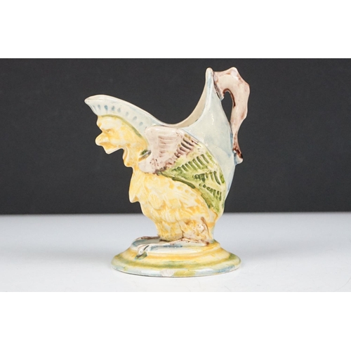 51 - 19th Century Victorian English majolica jug in the form of a griffin style mythical creature. Measur... 