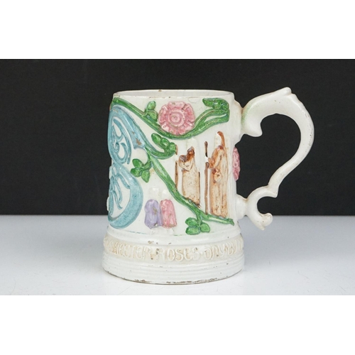 54 - 19th Century Victorian Compton Pottery mug decorated in relief with figures and foliate patterns, wi... 