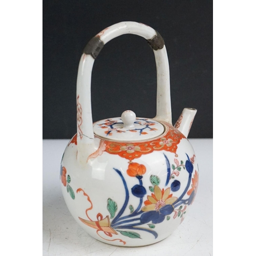 60 - Japanese Imari teapot & cover with high loop handle and floral decoration (approx 18cm high), togeth... 