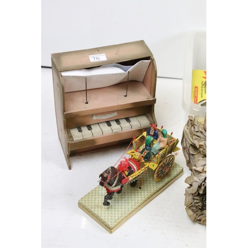 75 - A collection of early and mid 20th century toys and games to include a dolls house, nodding dog, hor... 