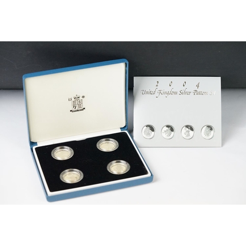 593 - A Royal Mint United Kingdom 2004 silver proof pattern collection one pound coin four coin set, coins... 