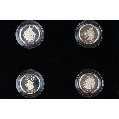 593 - A Royal Mint United Kingdom 2004 silver proof pattern collection one pound coin four coin set, coins... 