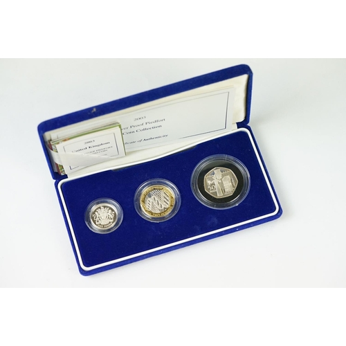 594 - A Royal Mint United Kingdom 2003 silver proof Piedfort three coin set to include 50p, £1 & £2 coins,... 