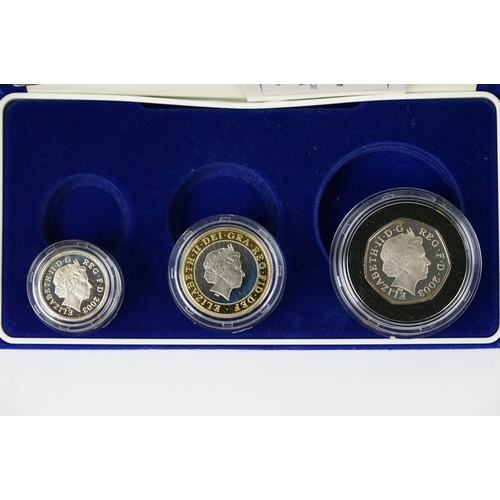 594 - A Royal Mint United Kingdom 2003 silver proof Piedfort three coin set to include 50p, £1 & £2 coins,... 