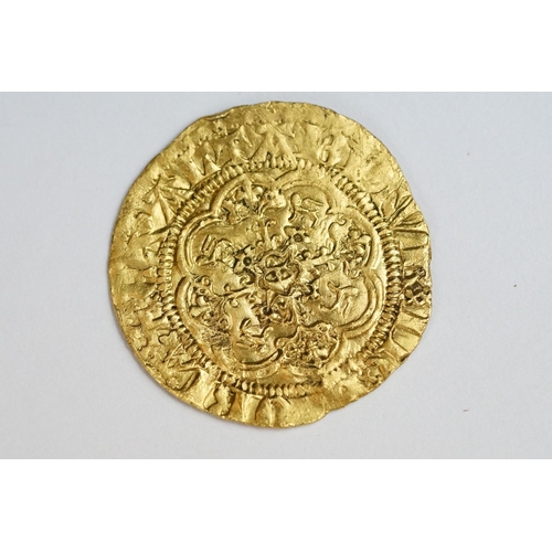 596 - A British 14th Century King Edward III gold quarter noble coin.