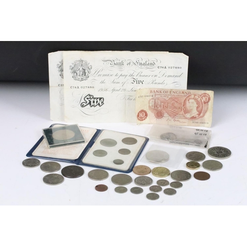 599 - A small collection of British coins and banknotes to include two white £5 notes and a small quantity... 