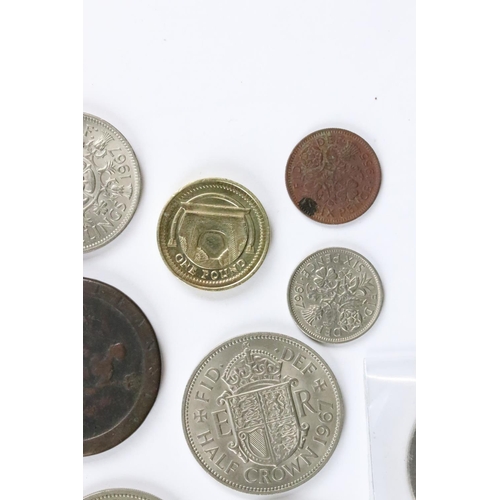 599 - A small collection of British coins and banknotes to include two white £5 notes and a small quantity... 