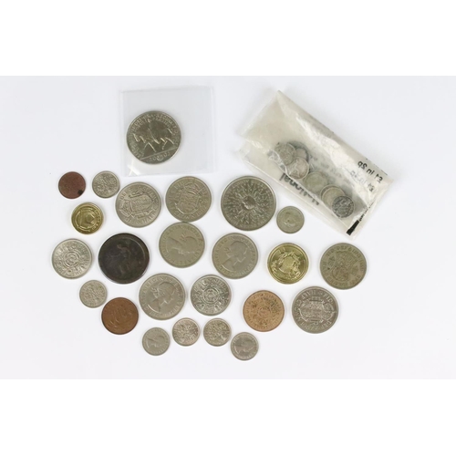 599 - A small collection of British coins and banknotes to include two white £5 notes and a small quantity... 