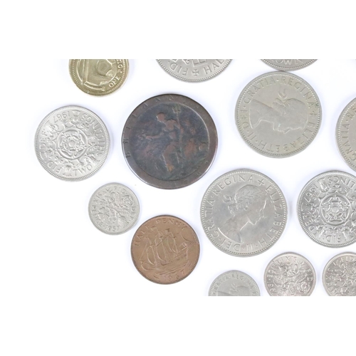 599 - A small collection of British coins and banknotes to include two white £5 notes and a small quantity... 