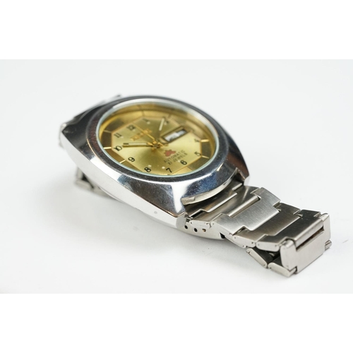 264 - Ricoh Automatic stainless steel gents wristwatch, date aperture, gold-coloured dial, Arabic numerals... 