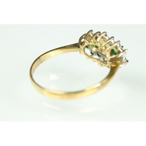 209 - Emerald and cubic zirconia 9ct yellow gold and white gold set ring, three graduated round mixed cut ... 