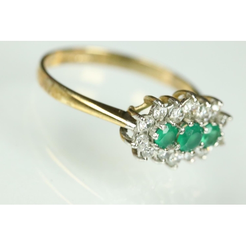 209 - Emerald and cubic zirconia 9ct yellow gold and white gold set ring, three graduated round mixed cut ... 