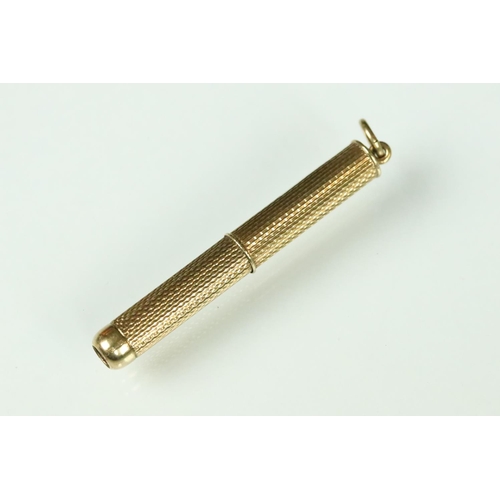 33 - 9ct gold cased retractable toothpick (toothpick deficient) together with an early 20th century synth... 