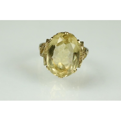 35 - Citrine 9ct yellow gold ring, the oval mixed cut citrine measuring approx 16 x 12mm, claw set, pierc... 