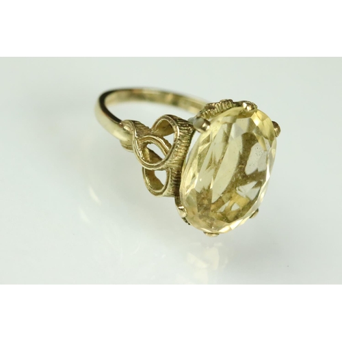 35 - Citrine 9ct yellow gold ring, the oval mixed cut citrine measuring approx 16 x 12mm, claw set, pierc... 