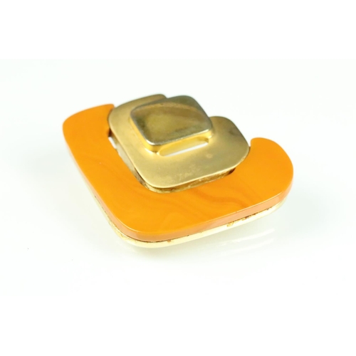 85A - Christian Dior modernist style brooch having concentric square on an amber coloured panel. Signed to... 