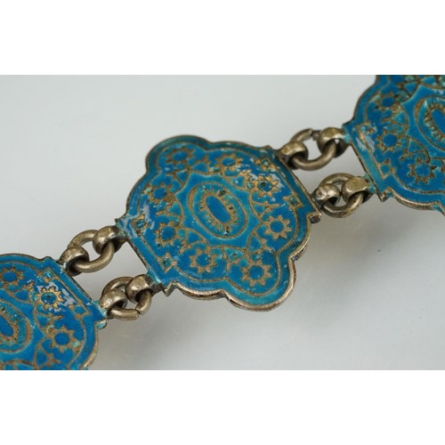 109 - Collection of early 20th century jewellery to include an enamelled white metal bracelet, seven blue ... 