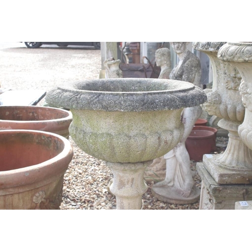 279 - Reconstituted stone garden urn, the bowl of shallow form, raised on a baluster column base. (Measure... 
