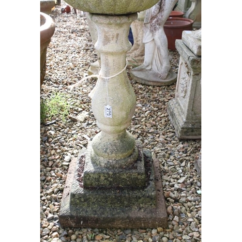 279 - Reconstituted stone garden urn, the bowl of shallow form, raised on a baluster column base. (Measure... 