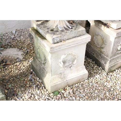 281 - Pair of reconstituted stone garden urns, the bowls of shallow form, with ovolu-moulded rims and gadr... 