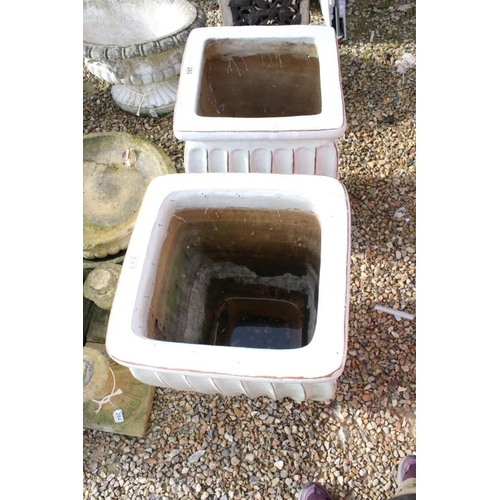 283 - Pair of large glazed terracotta garden planters of fluted tapering form (approx 67cm high)