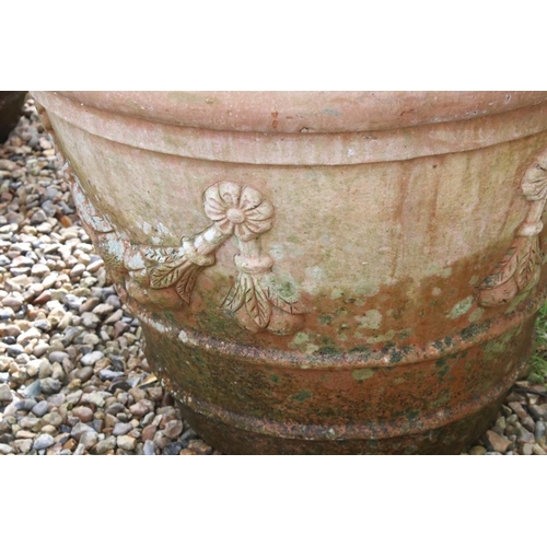 290 - Pair of large terracotta planters, of tapering circular form, with relief garland decoration, each w... 