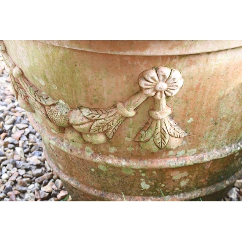 290 - Pair of large terracotta planters, of tapering circular form, with relief garland decoration, each w... 
