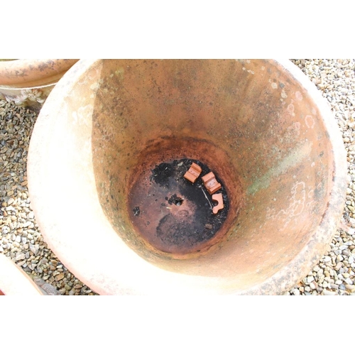 290 - Pair of large terracotta planters, of tapering circular form, with relief garland decoration, each w... 