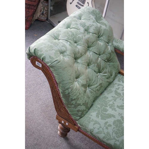 292 - Victorian Walnut Framed Chaise-lounge with green button back upholstery, raised on turned legs with ... 