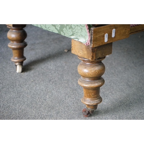 292 - Victorian Walnut Framed Chaise-lounge with green button back upholstery, raised on turned legs with ... 