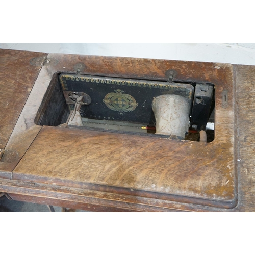294 - Singer Treadle Sewing Machine, 91cm long x 78cm high