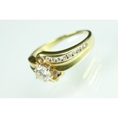 51A - Diamond 18ct yellow gold solitaire ring, the round brilliant cut diamond weighing approx 0.60 carat,... 