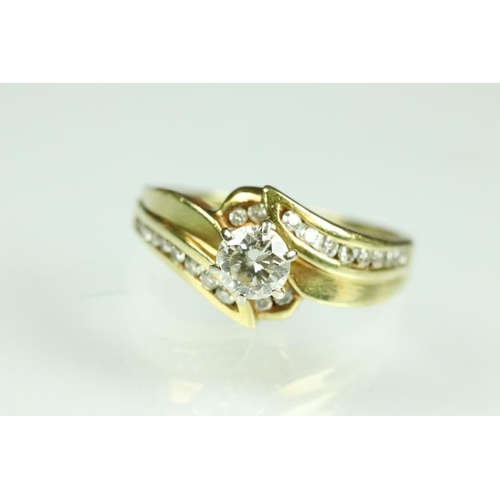 51A - Diamond 18ct yellow gold solitaire ring, the round brilliant cut diamond weighing approx 0.60 carat,... 