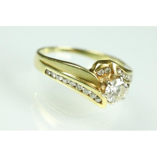 51A - Diamond 18ct yellow gold solitaire ring, the round brilliant cut diamond weighing approx 0.60 carat,... 