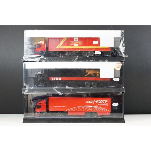 1015 - Three cased Corgi modern trucks 1/50 diecast models to include 75502 Royal Mail (with outside plasti... 