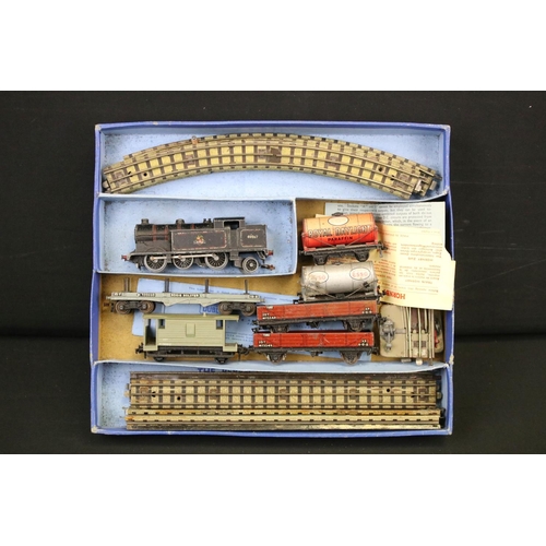 103 - Quantity of Hornby Dublo model railway contained within 4 x boxed sets, include 4 x locomotives feat... 