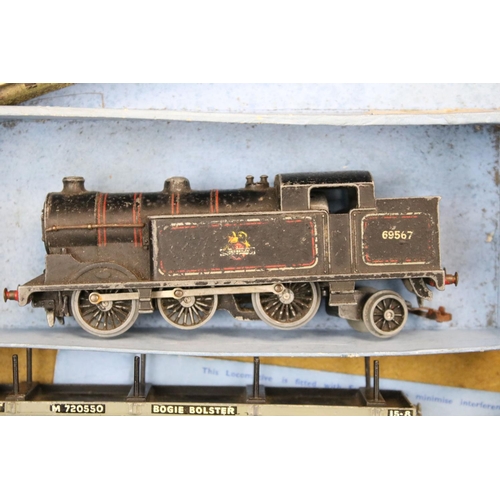 103 - Quantity of Hornby Dublo model railway contained within 4 x boxed sets, include 4 x locomotives feat... 