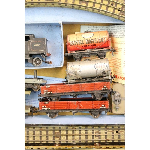 103 - Quantity of Hornby Dublo model railway contained within 4 x boxed sets, include 4 x locomotives feat... 