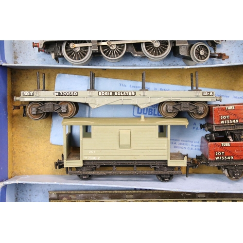 103 - Quantity of Hornby Dublo model railway contained within 4 x boxed sets, include 4 x locomotives feat... 