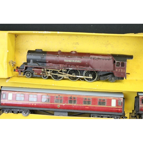 103 - Quantity of Hornby Dublo model railway contained within 4 x boxed sets, include 4 x locomotives feat... 