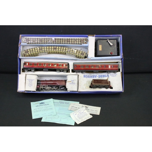 103 - Quantity of Hornby Dublo model railway contained within 4 x boxed sets, include 4 x locomotives feat... 