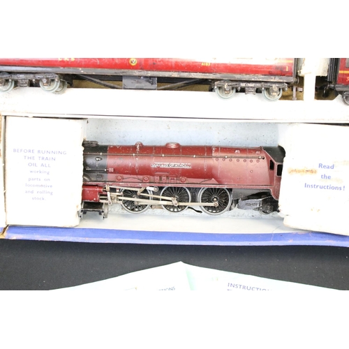 103 - Quantity of Hornby Dublo model railway contained within 4 x boxed sets, include 4 x locomotives feat... 