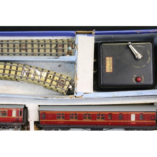 103 - Quantity of Hornby Dublo model railway contained within 4 x boxed sets, include 4 x locomotives feat... 