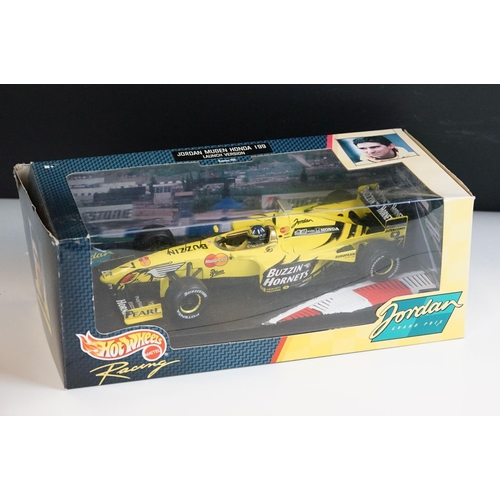 1030 - 15 Boxed / cased F1 related diecast models and helmets to include 4 x cased Heritage Classics, 1/18 ... 