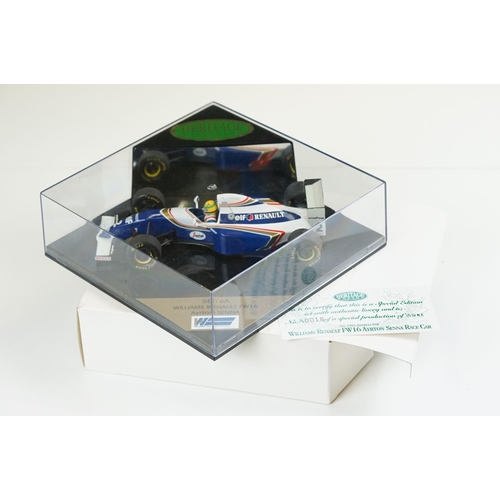 1030 - 15 Boxed / cased F1 related diecast models and helmets to include 4 x cased Heritage Classics, 1/18 ... 