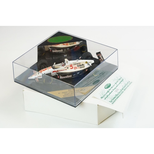 1030 - 15 Boxed / cased F1 related diecast models and helmets to include 4 x cased Heritage Classics, 1/18 ... 