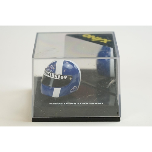 1030 - 15 Boxed / cased F1 related diecast models and helmets to include 4 x cased Heritage Classics, 1/18 ... 