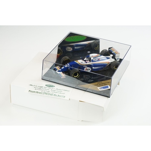 1030 - 15 Boxed / cased F1 related diecast models and helmets to include 4 x cased Heritage Classics, 1/18 ... 